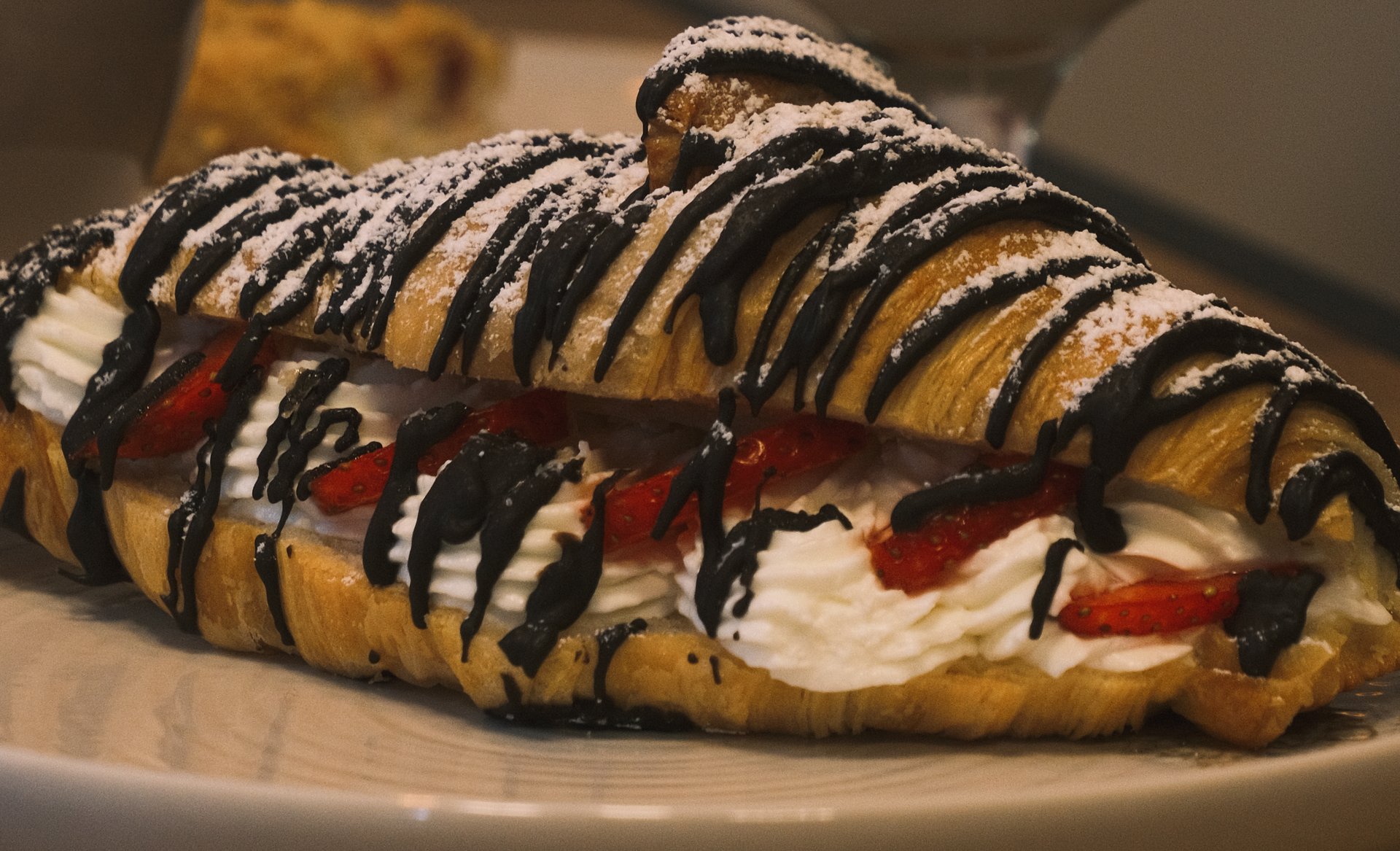 black and brown leather padded tub sofa