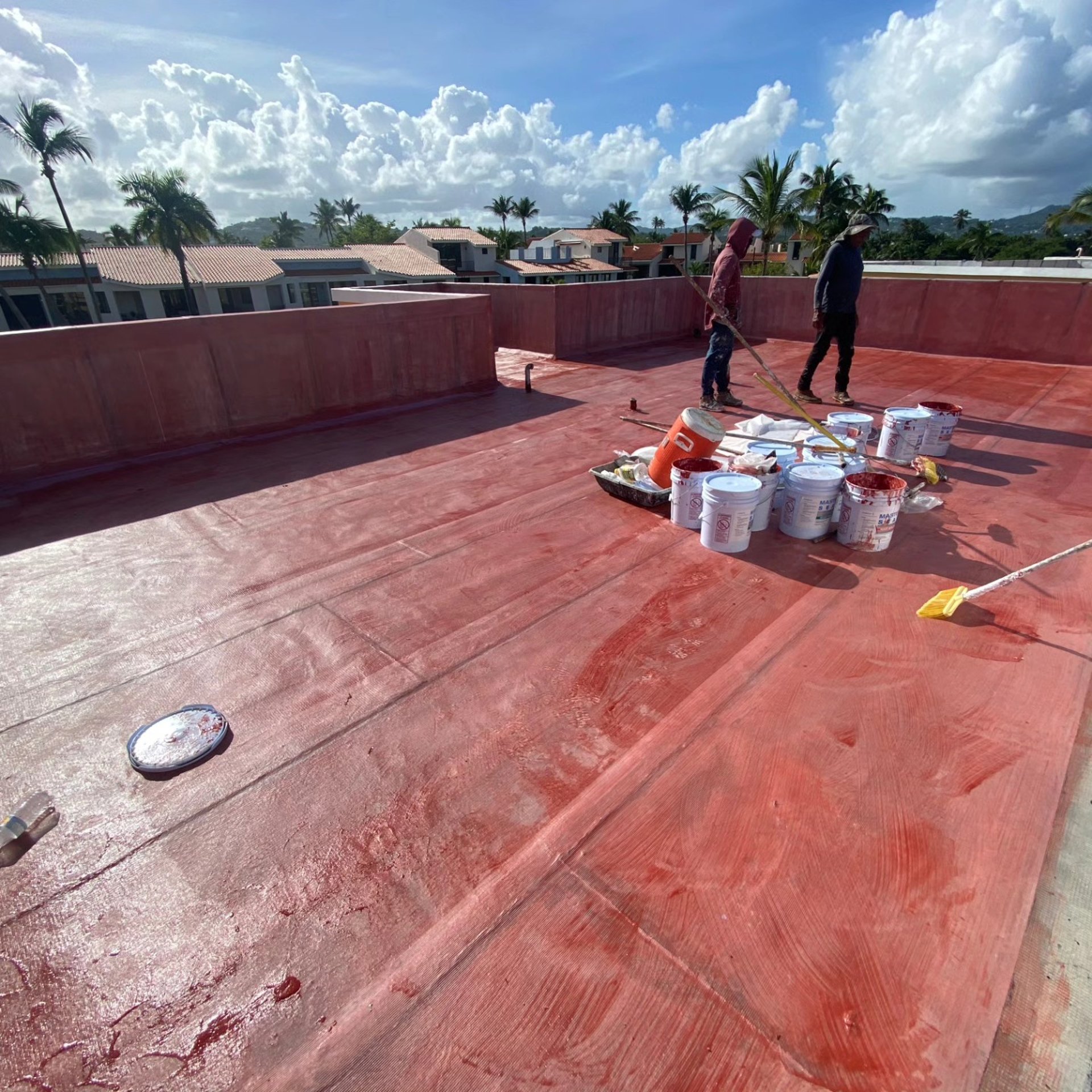 an abstract photo of a curved building with a blue sky in the background