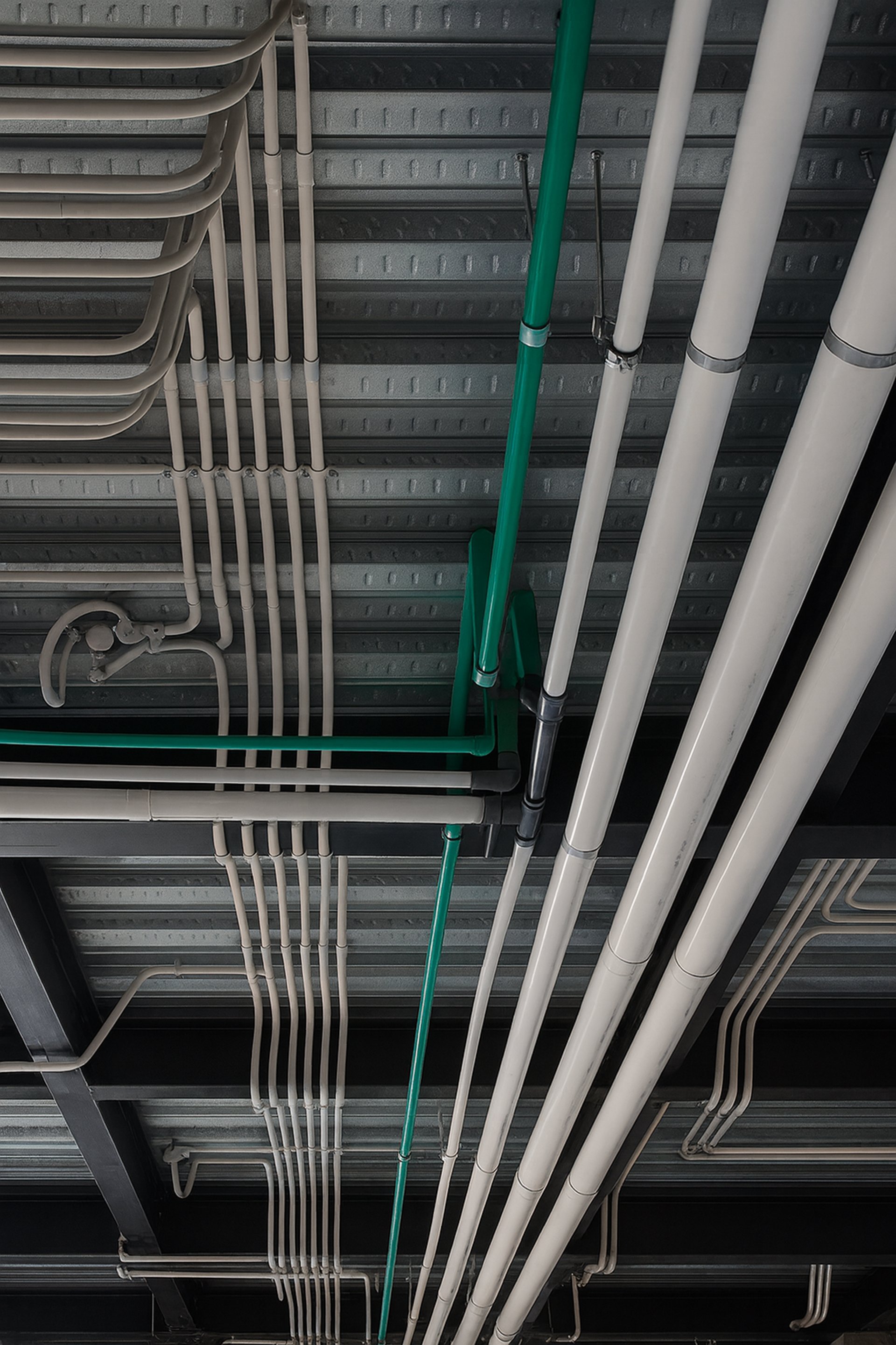 a close up of a bunch of pipes on a wall