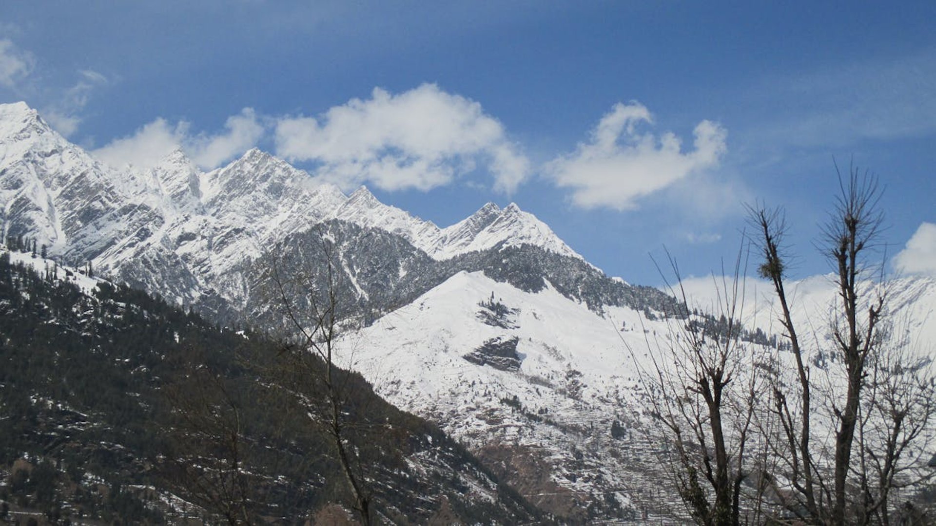 green mountain under white sky during daytime
