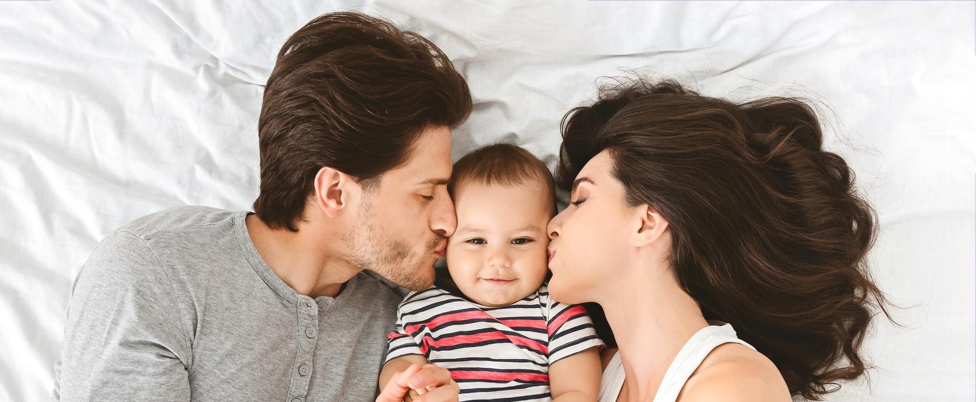 an abstract photo of a curved building with a blue sky in the background