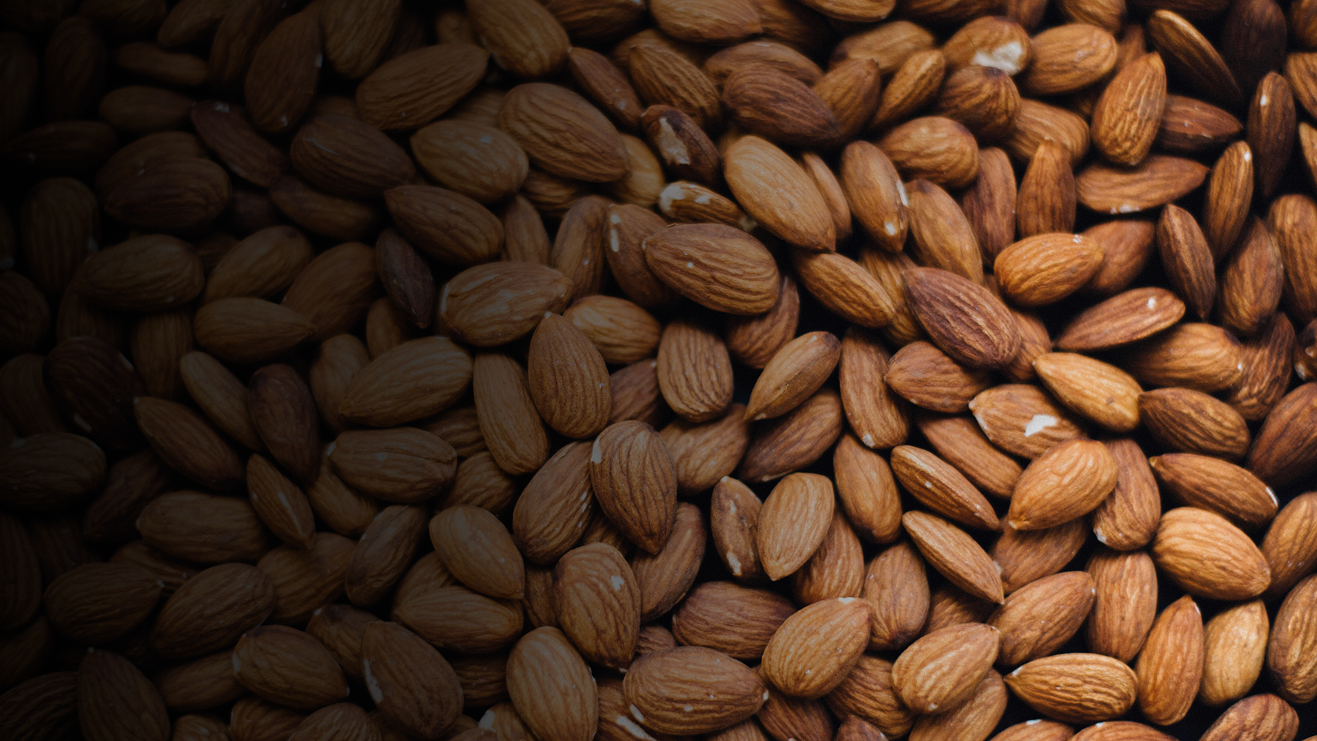 an abstract photo of a curved building with a blue sky in the background