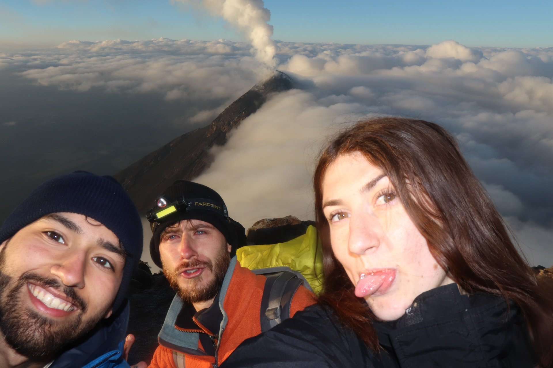 an abstract photo of a curved building with a blue sky in the background