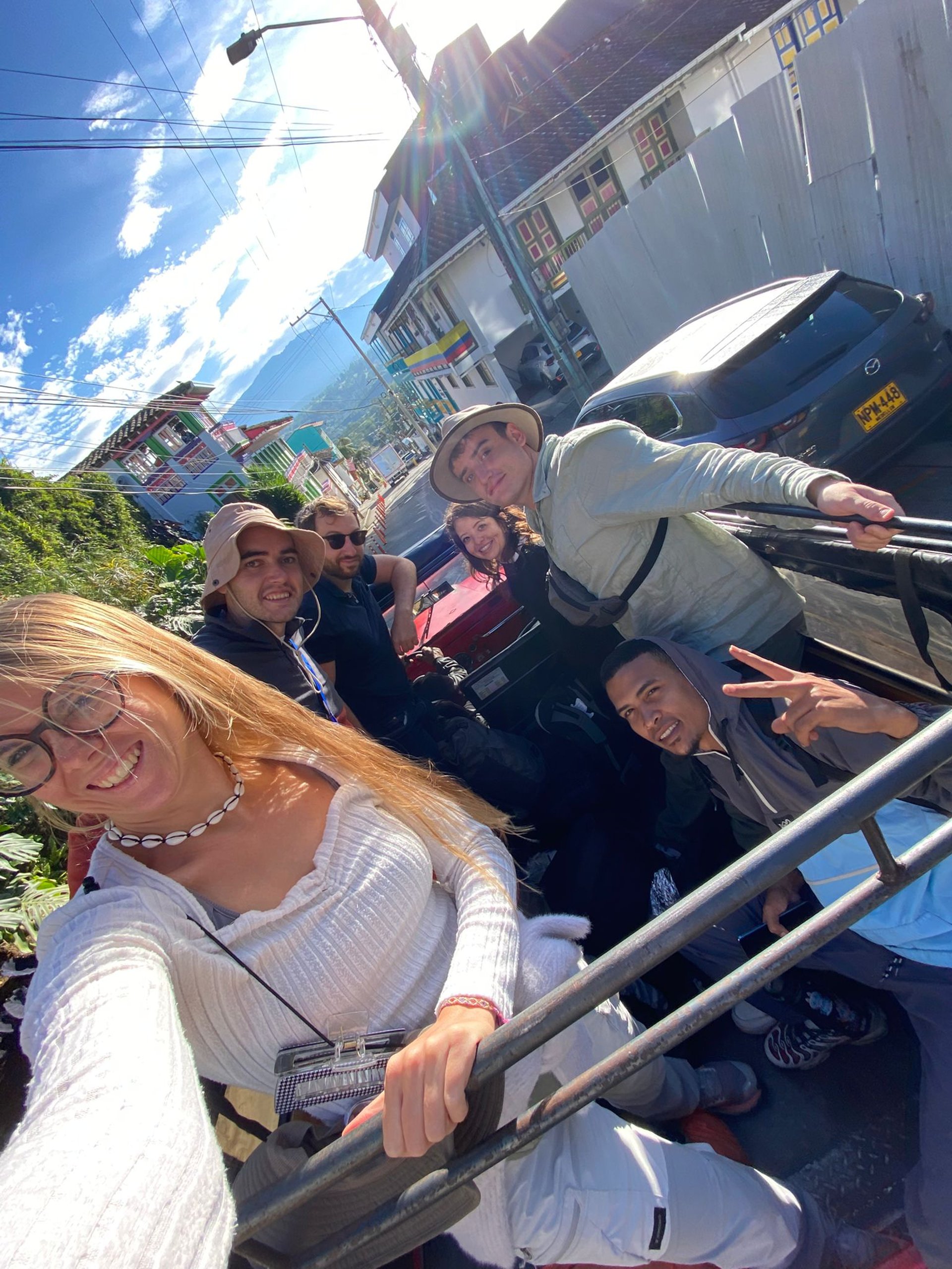 an abstract photo of a curved building with a blue sky in the background