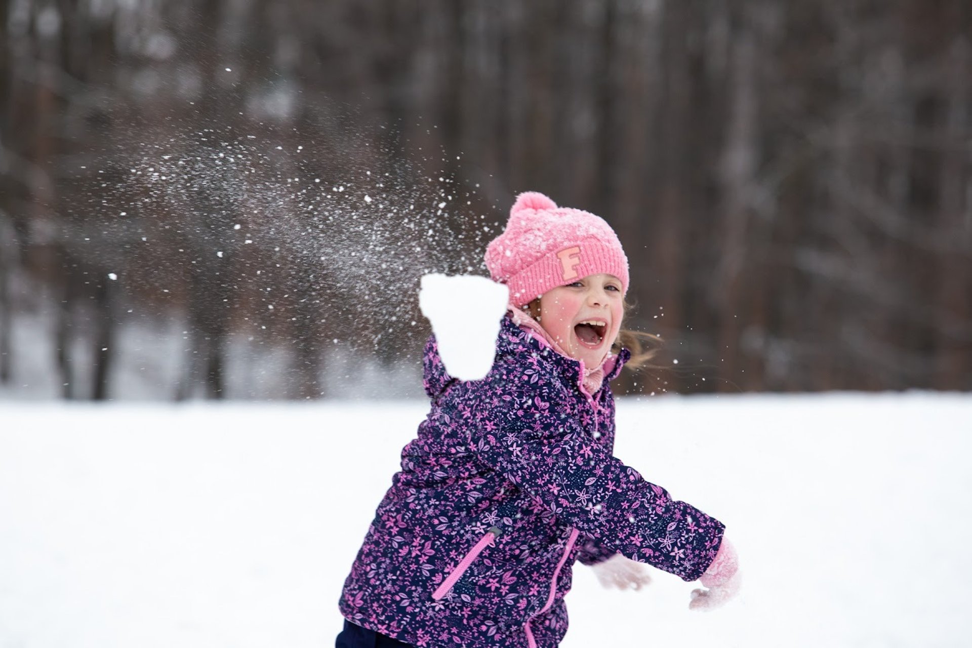 an abstract photo of a curved building with a blue sky in the background