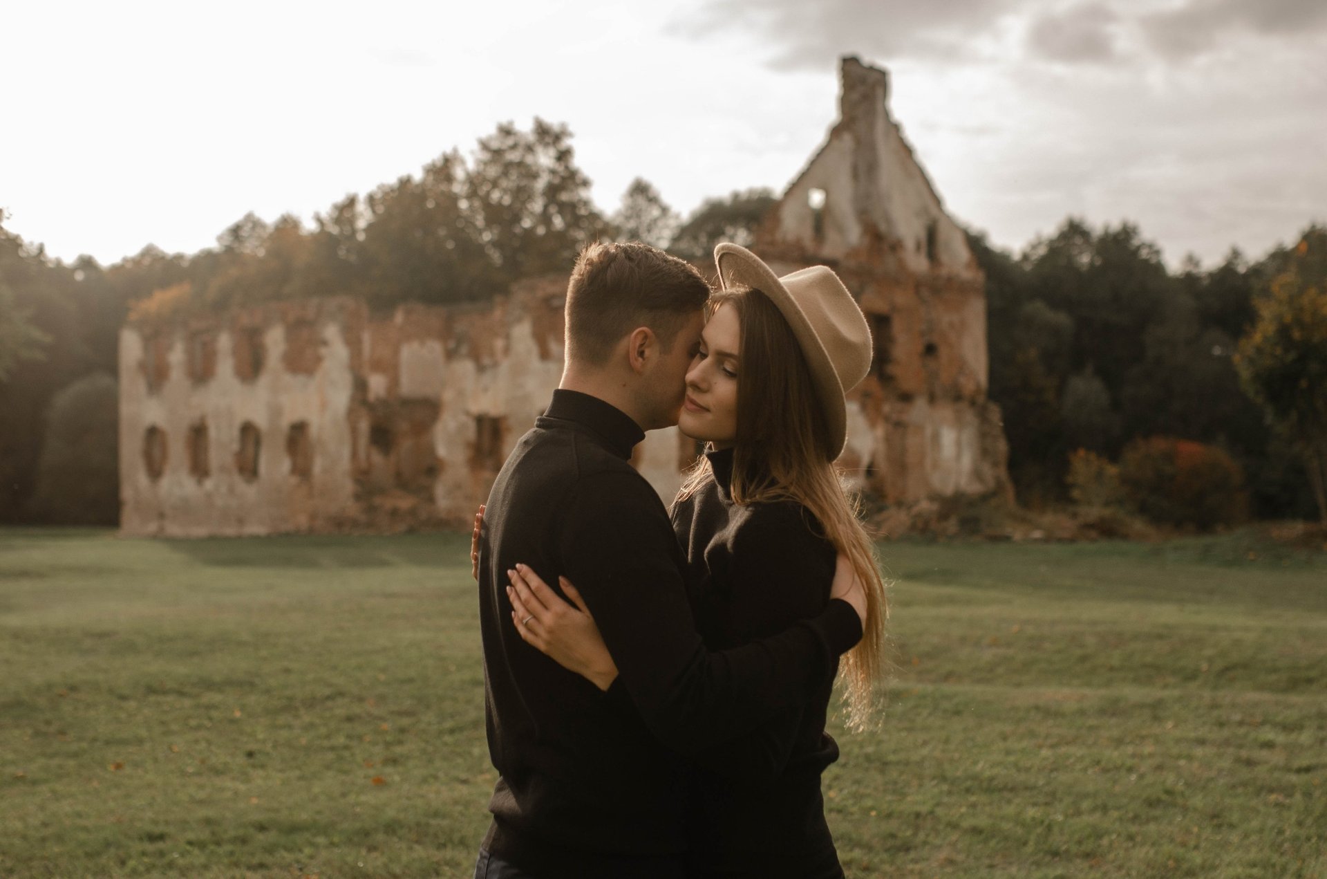 an abstract photo of a curved building with a blue sky in the background