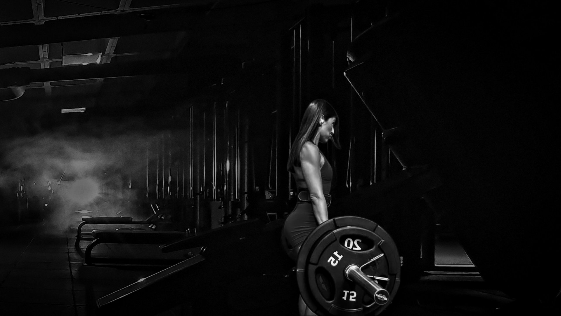 an abstract photo of a curved building with a blue sky in the background