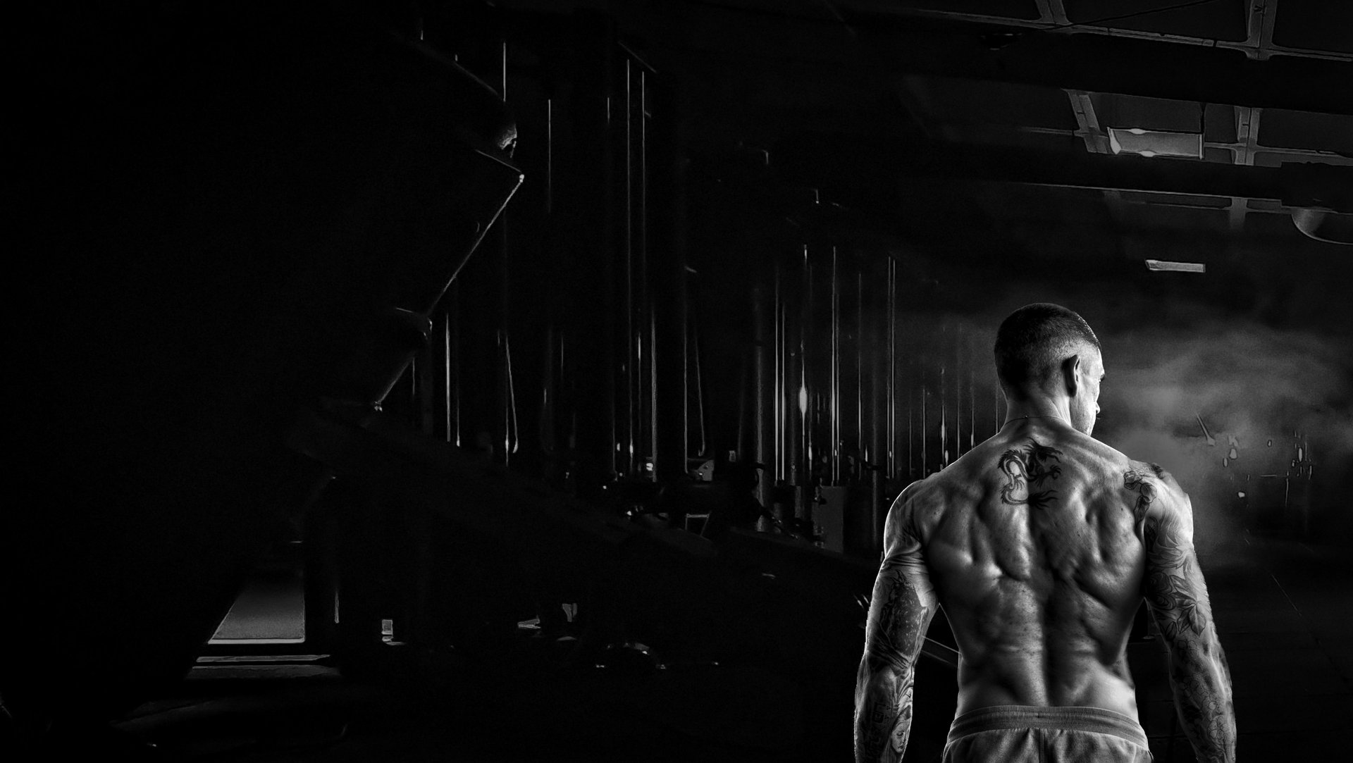 an abstract photo of a curved building with a blue sky in the background
