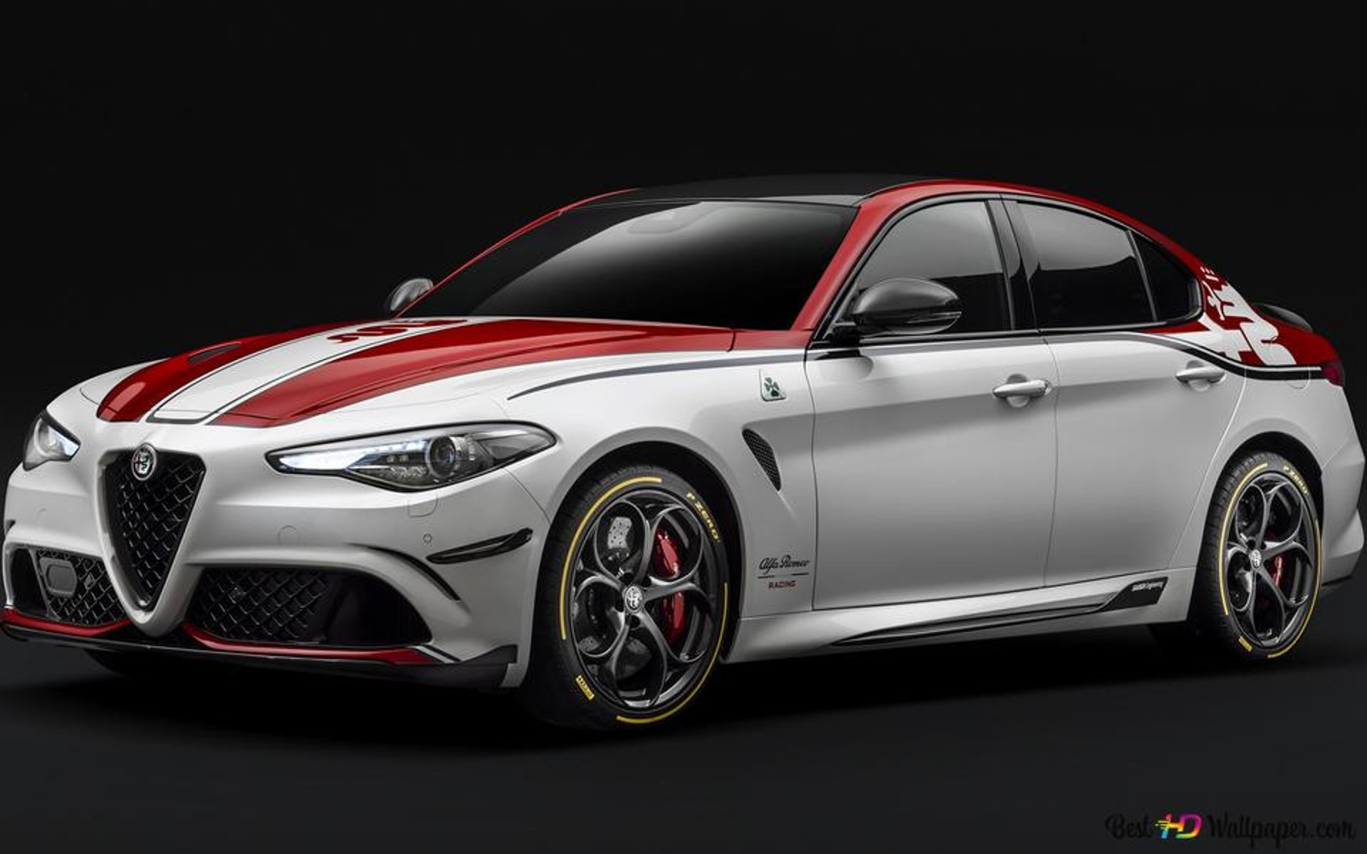 A red and white sports car in the dark