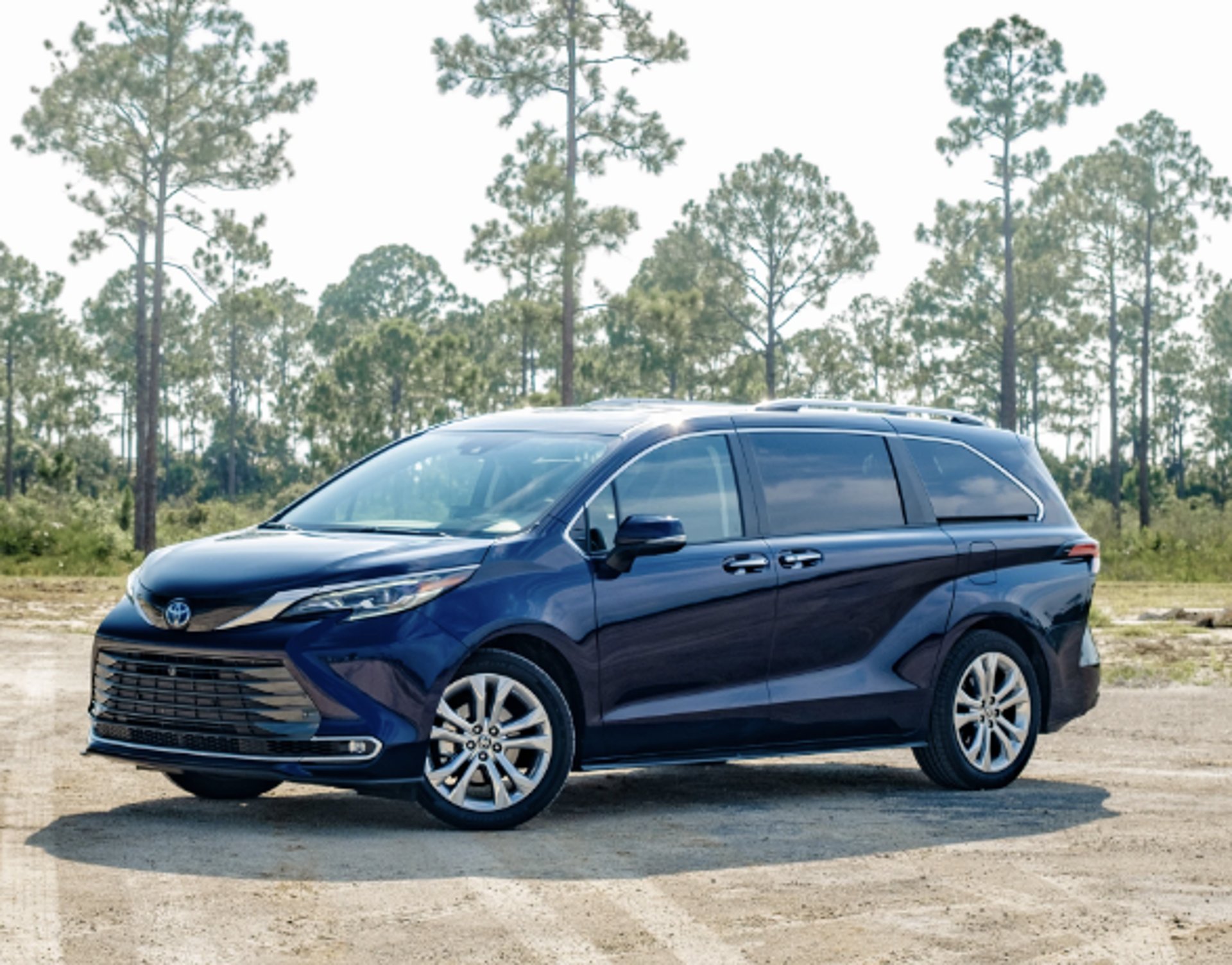 woman wearing yellow long-sleeved dress under white clouds and blue sky during daytime