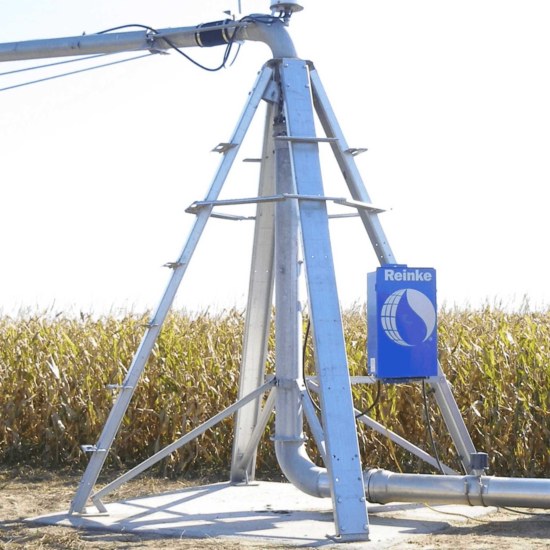 an abstract photo of a curved building with a blue sky in the background
