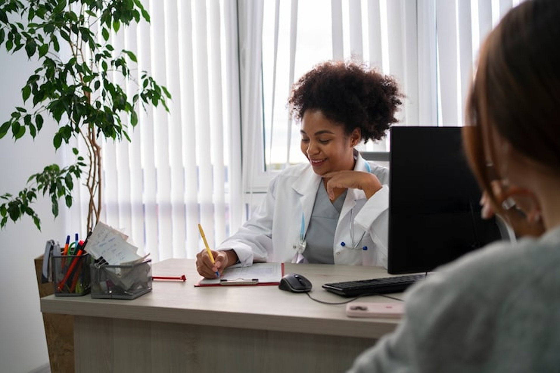 an abstract photo of a curved building with a blue sky in the background