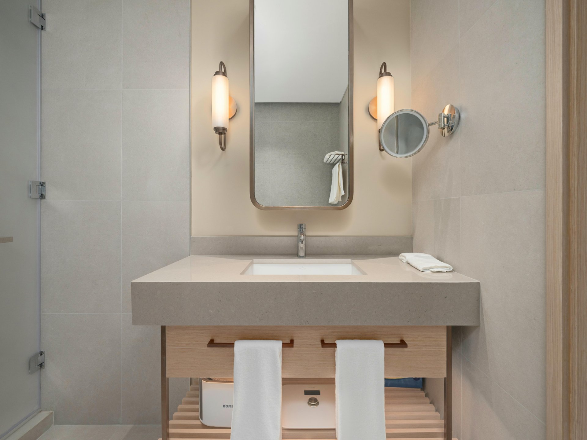 an abstract photo of a curved building with a blue sky in the background