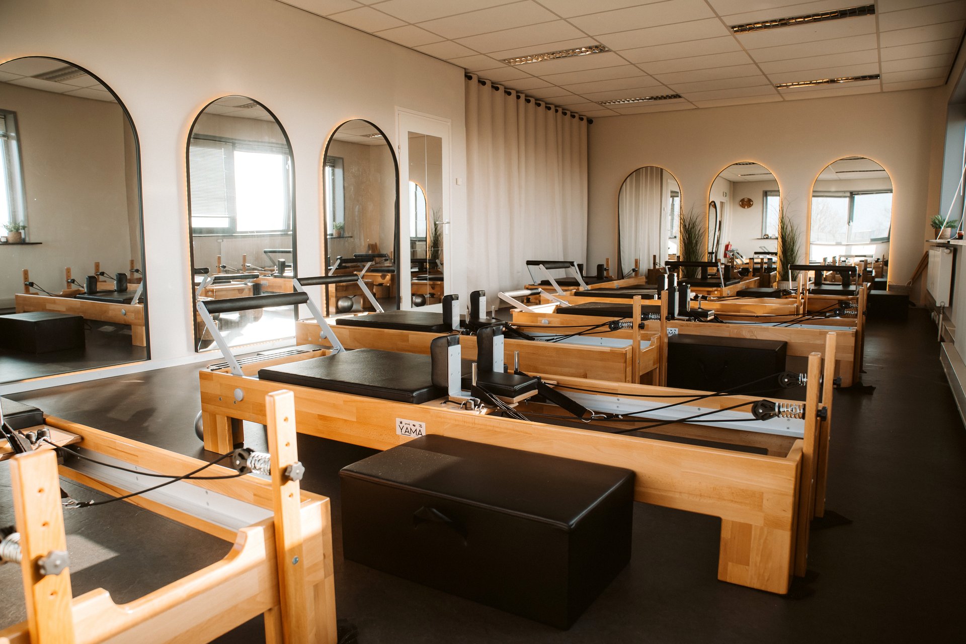 black and brown leather padded tub sofa