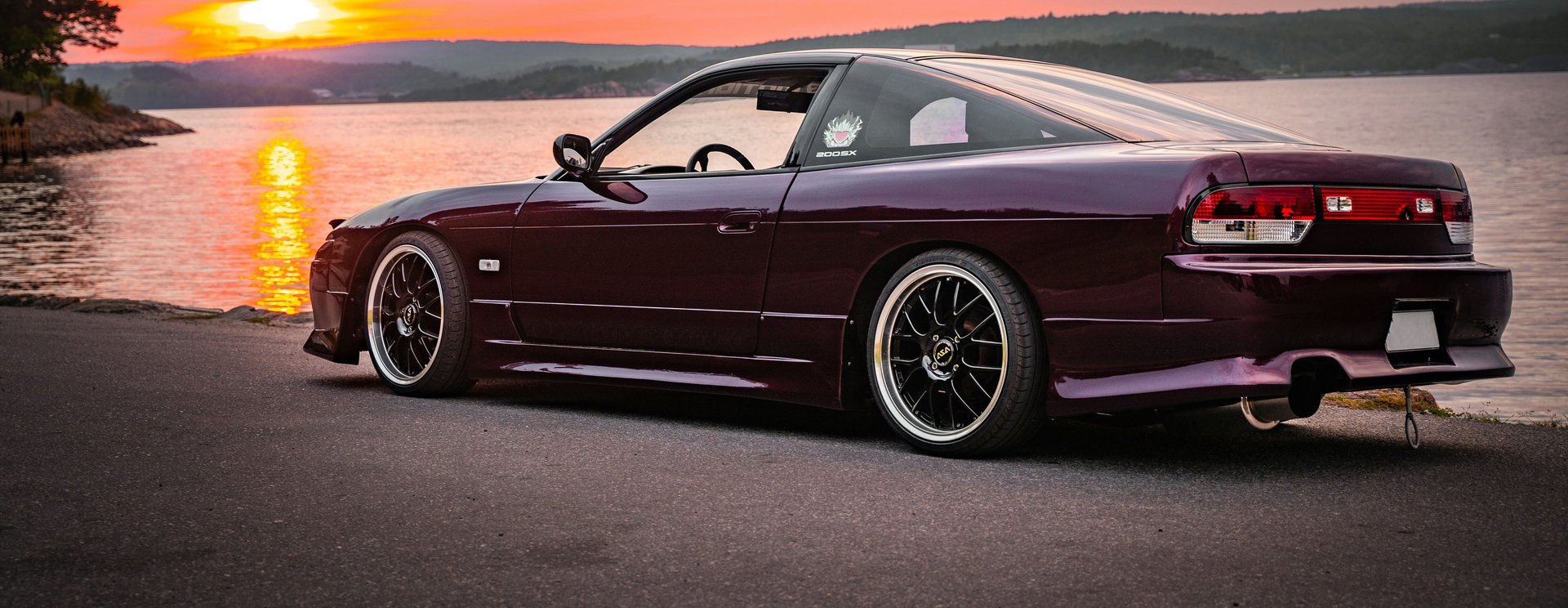 yellow sports car parking inside garage