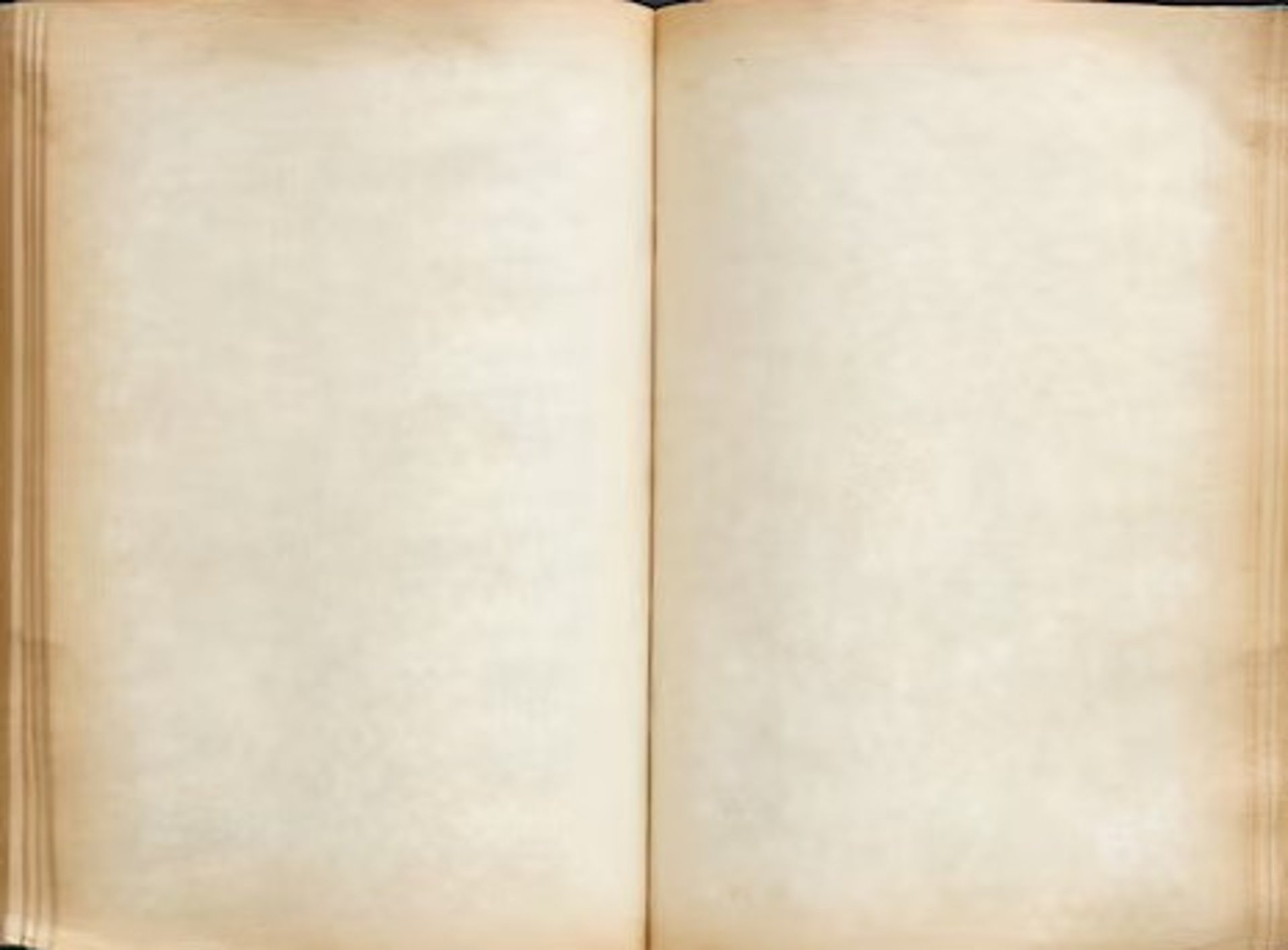 A stack of thick folders on a white surface