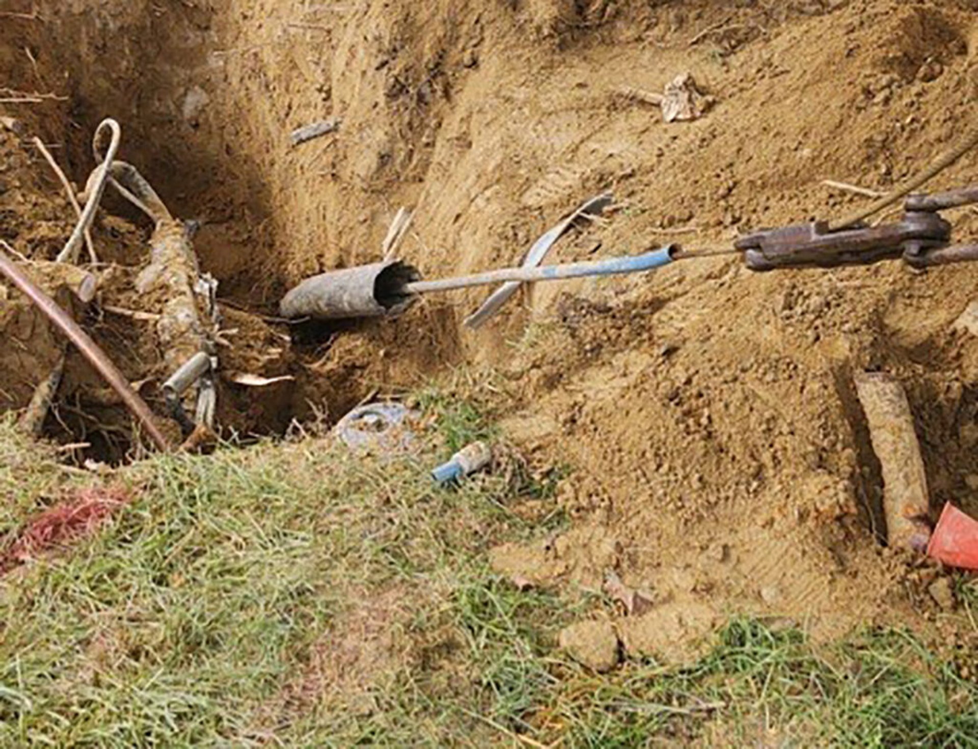 an abstract photo of a curved building with a blue sky in the background
