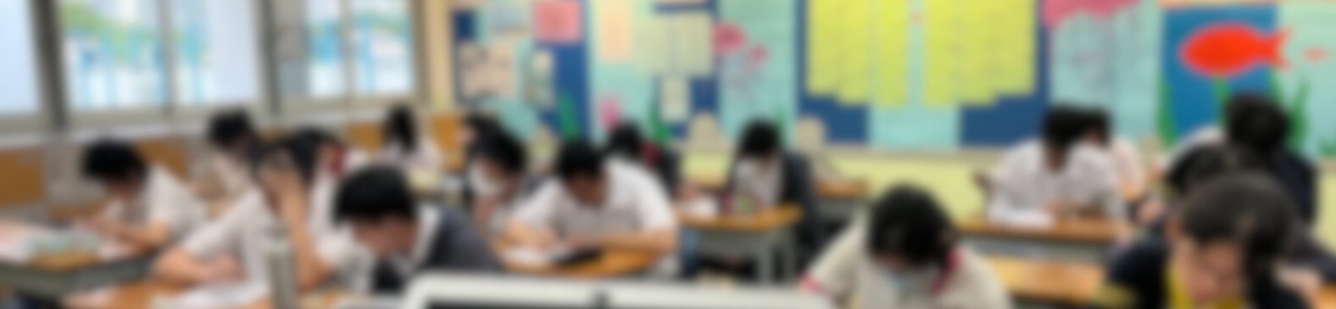 an abstract photo of a curved building with a blue sky in the background