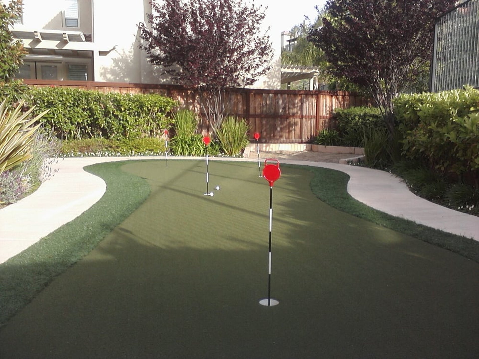 woman wearing yellow long-sleeved dress under white clouds and blue sky during daytime
