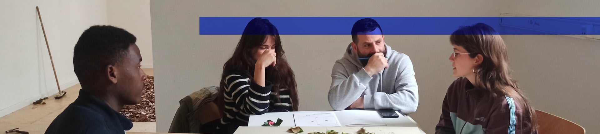 an abstract photo of a curved building with a blue sky in the background