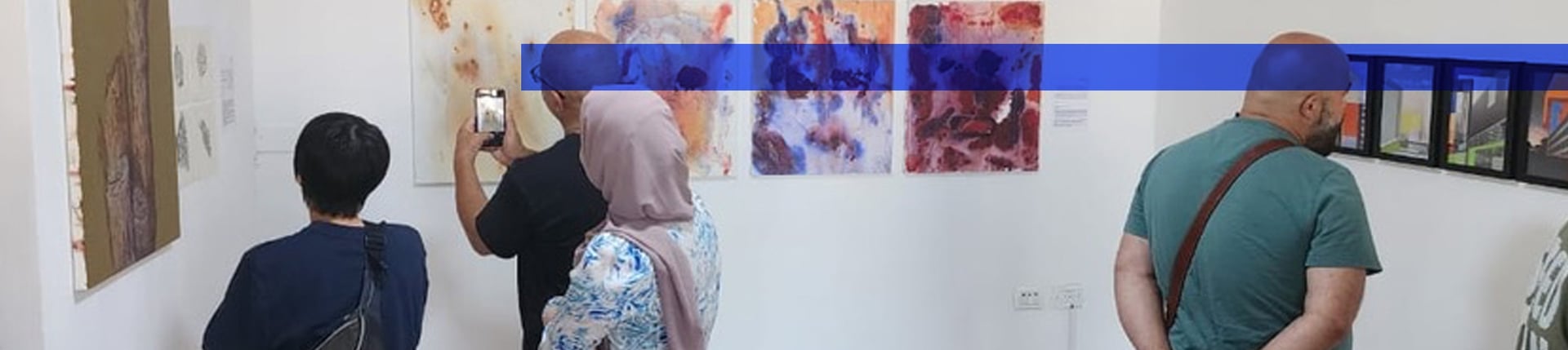 an abstract photo of a curved building with a blue sky in the background