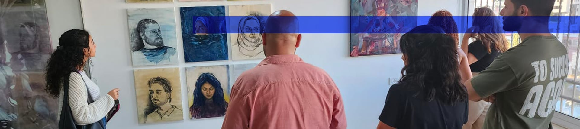 an abstract photo of a curved building with a blue sky in the background