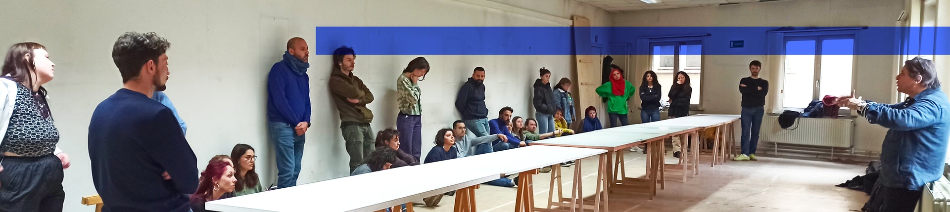 an abstract photo of a curved building with a blue sky in the background