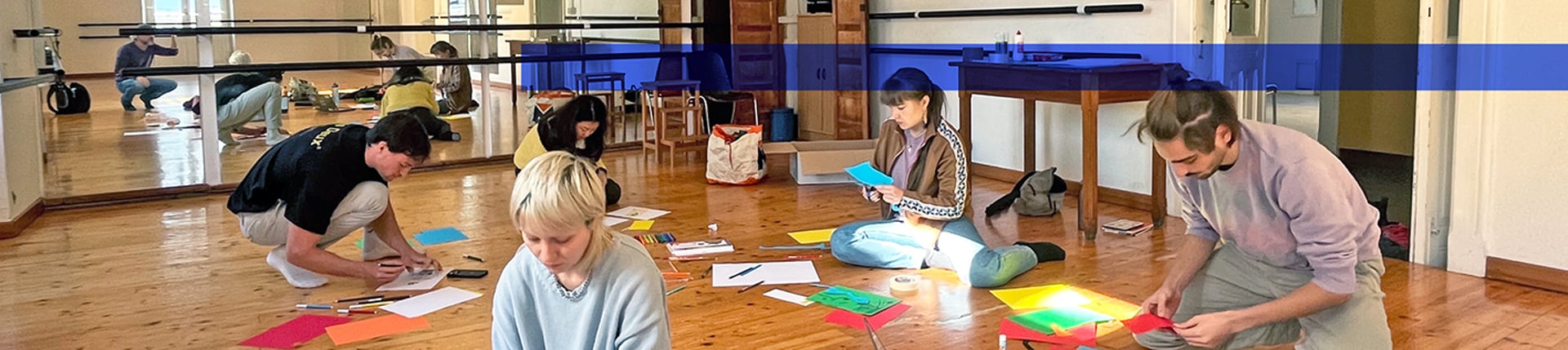 an abstract photo of a curved building with a blue sky in the background