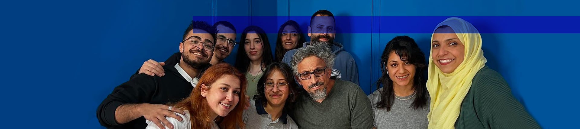 an abstract photo of a curved building with a blue sky in the background