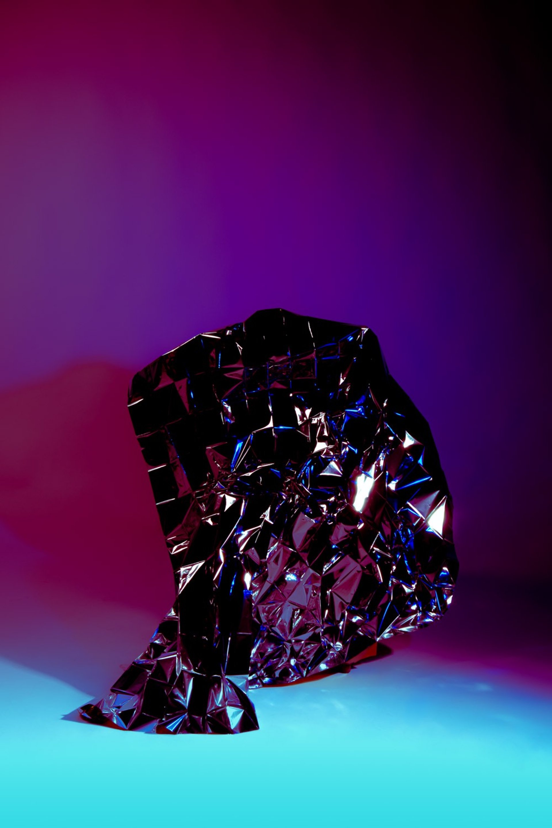 a close up of a black and brown abstract painting