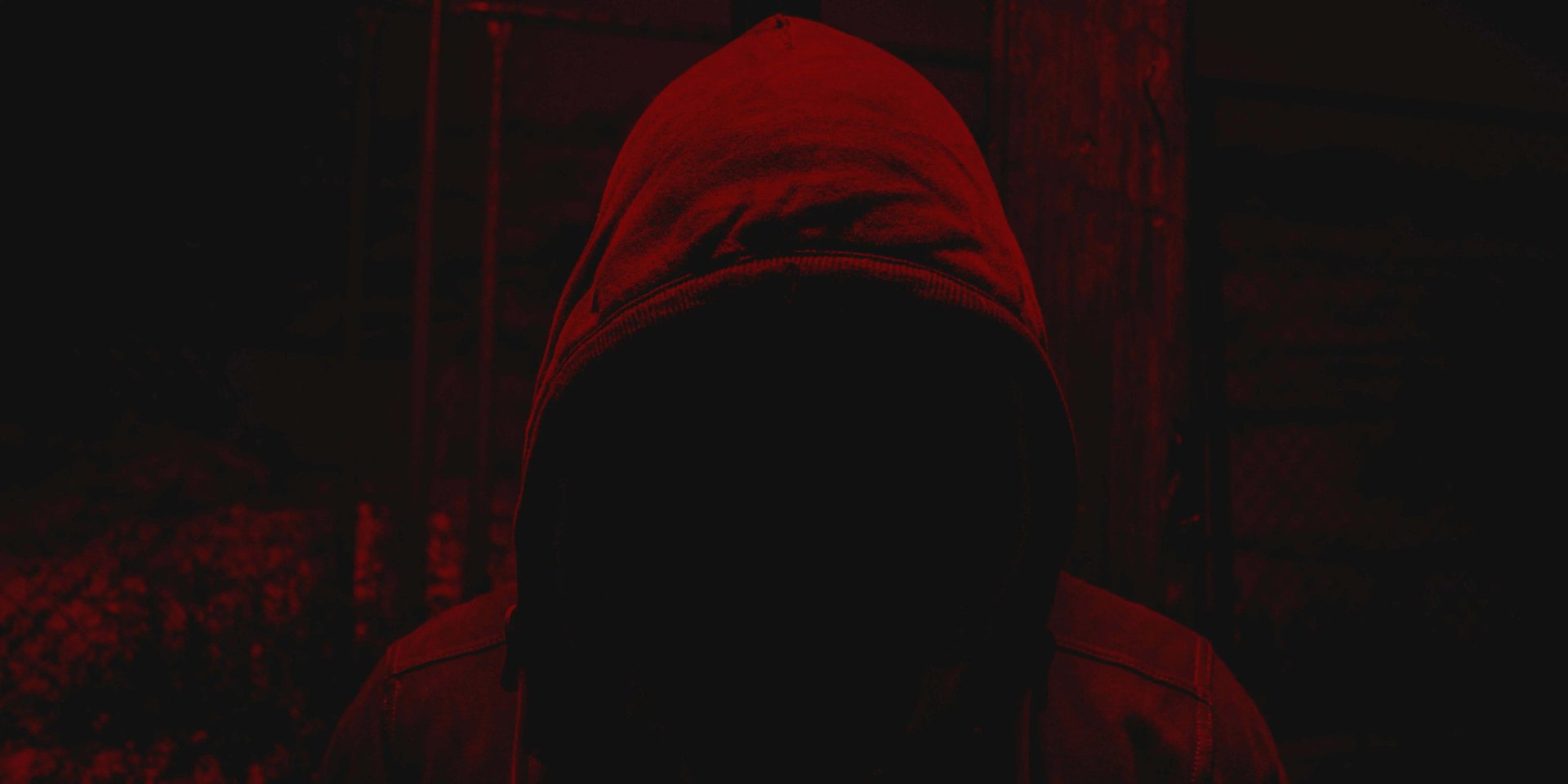 a close up of a black and brown abstract painting