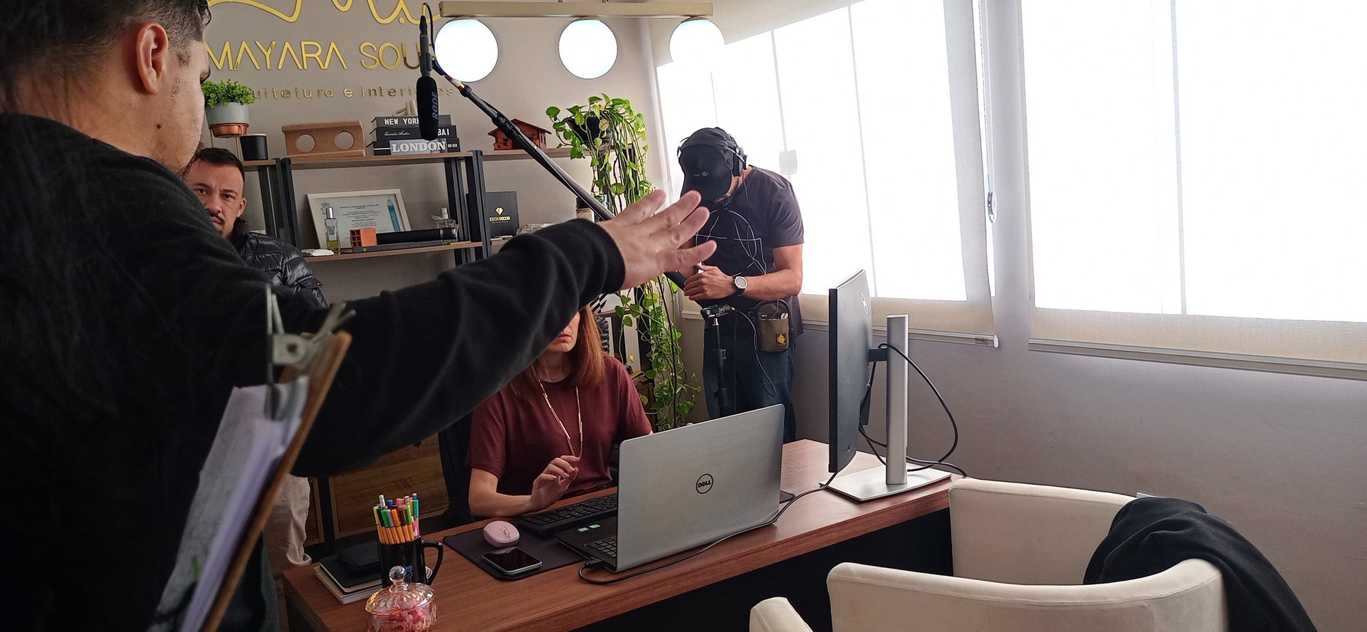 an abstract photo of a curved building with a blue sky in the background