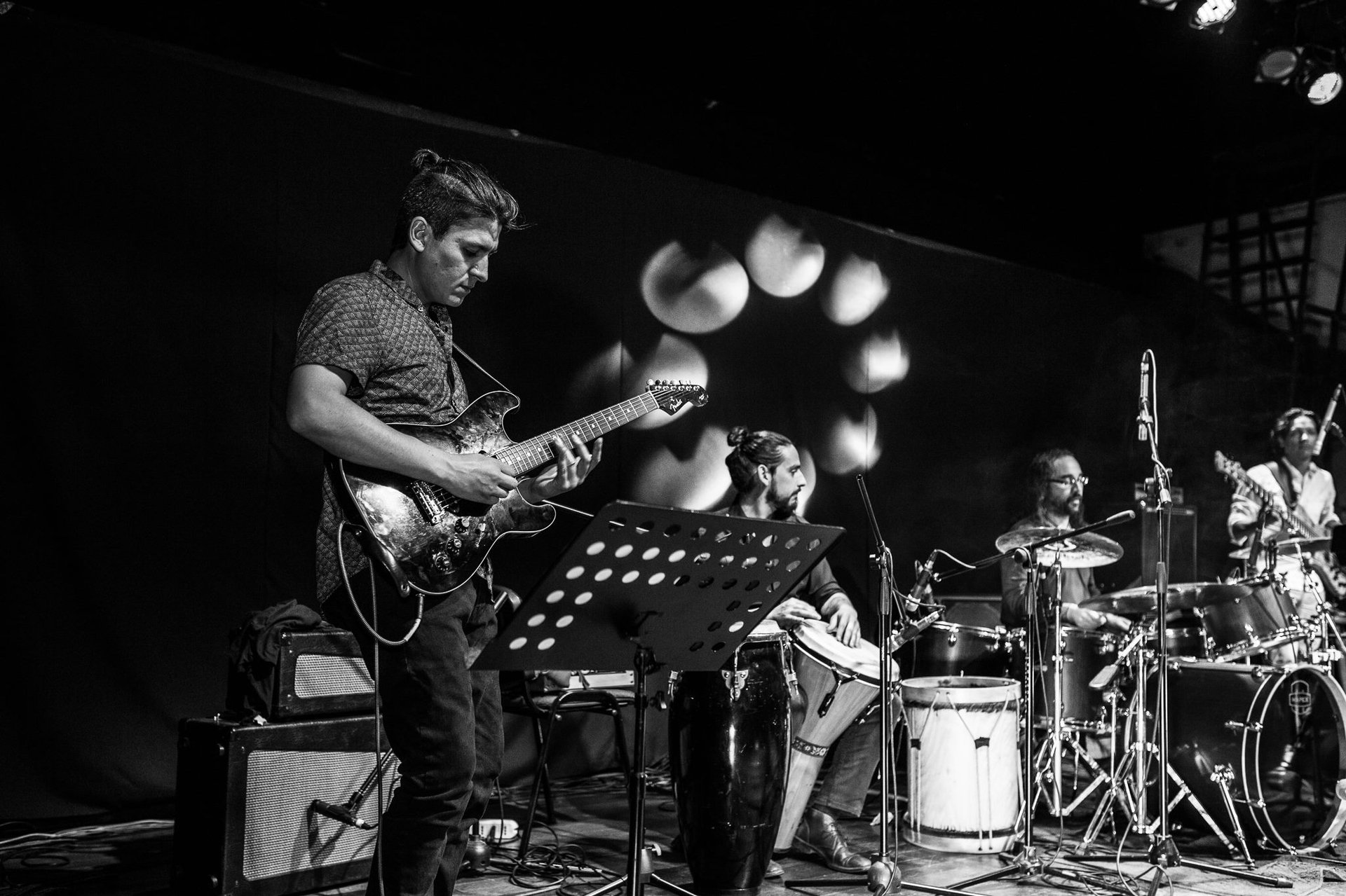 woman wearing yellow long-sleeved dress under white clouds and blue sky during daytime