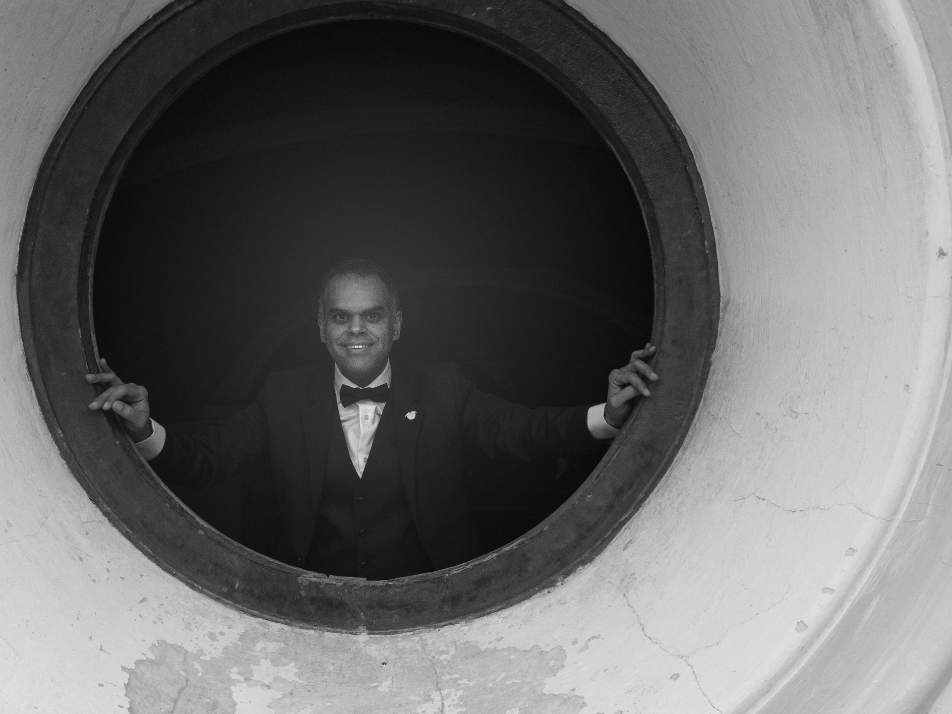 black and brown leather padded tub sofa