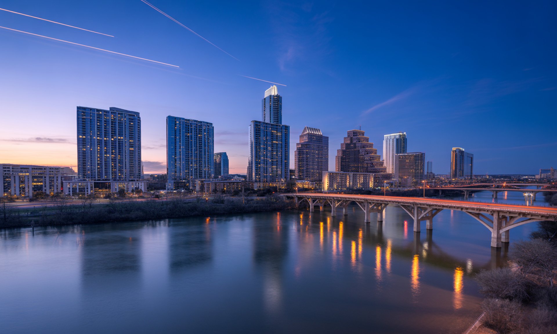 black and brown leather padded tub sofa