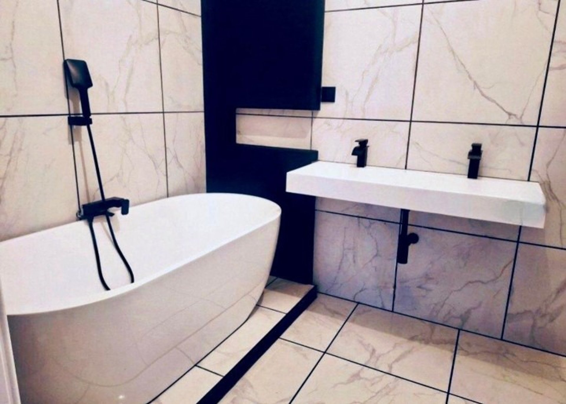 black and brown leather padded tub sofa