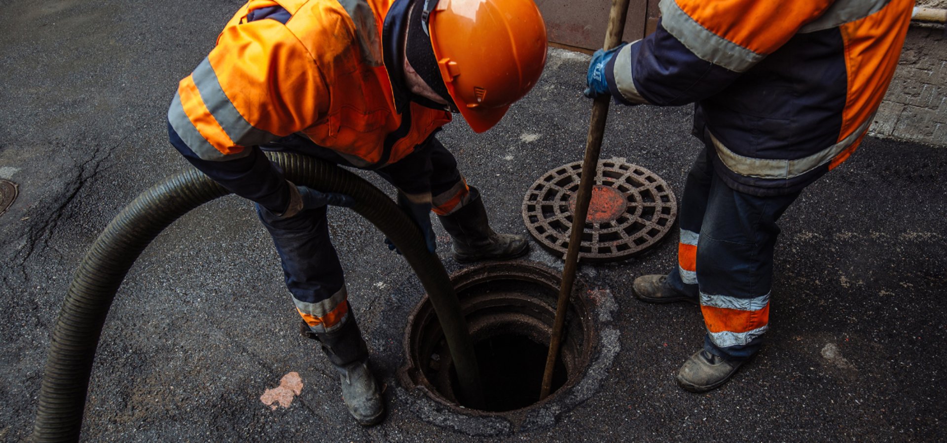 black and brown leather padded tub sofa