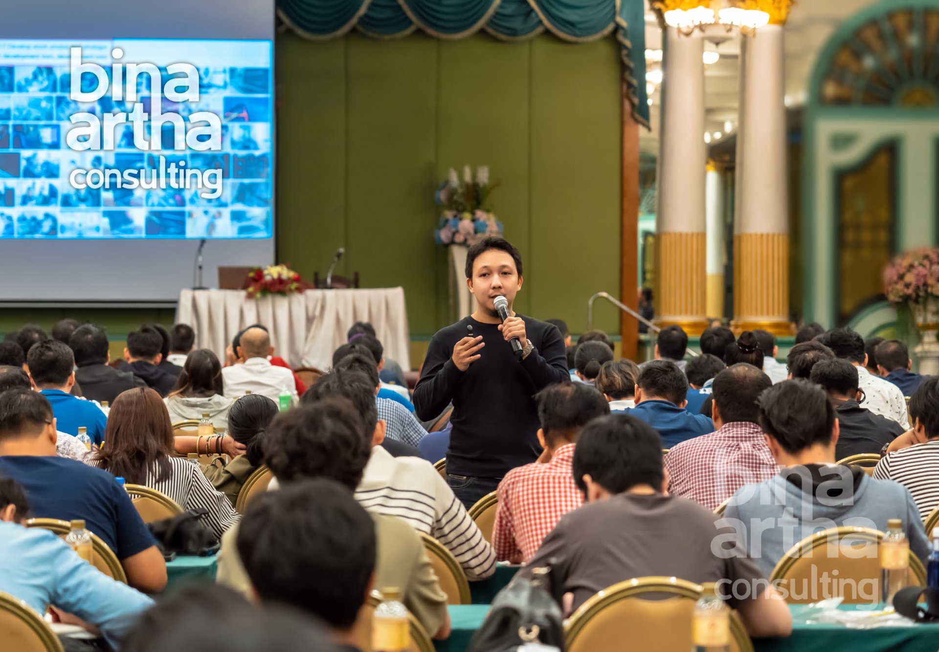 an abstract photo of a curved building with a blue sky in the background