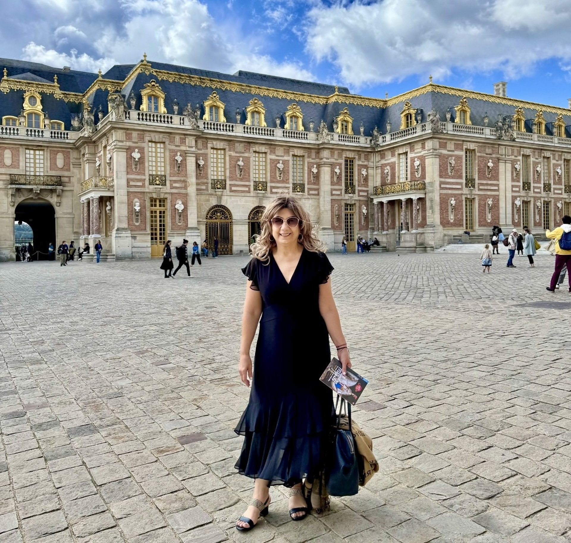 a colorful ferris wheel spinning in the dark