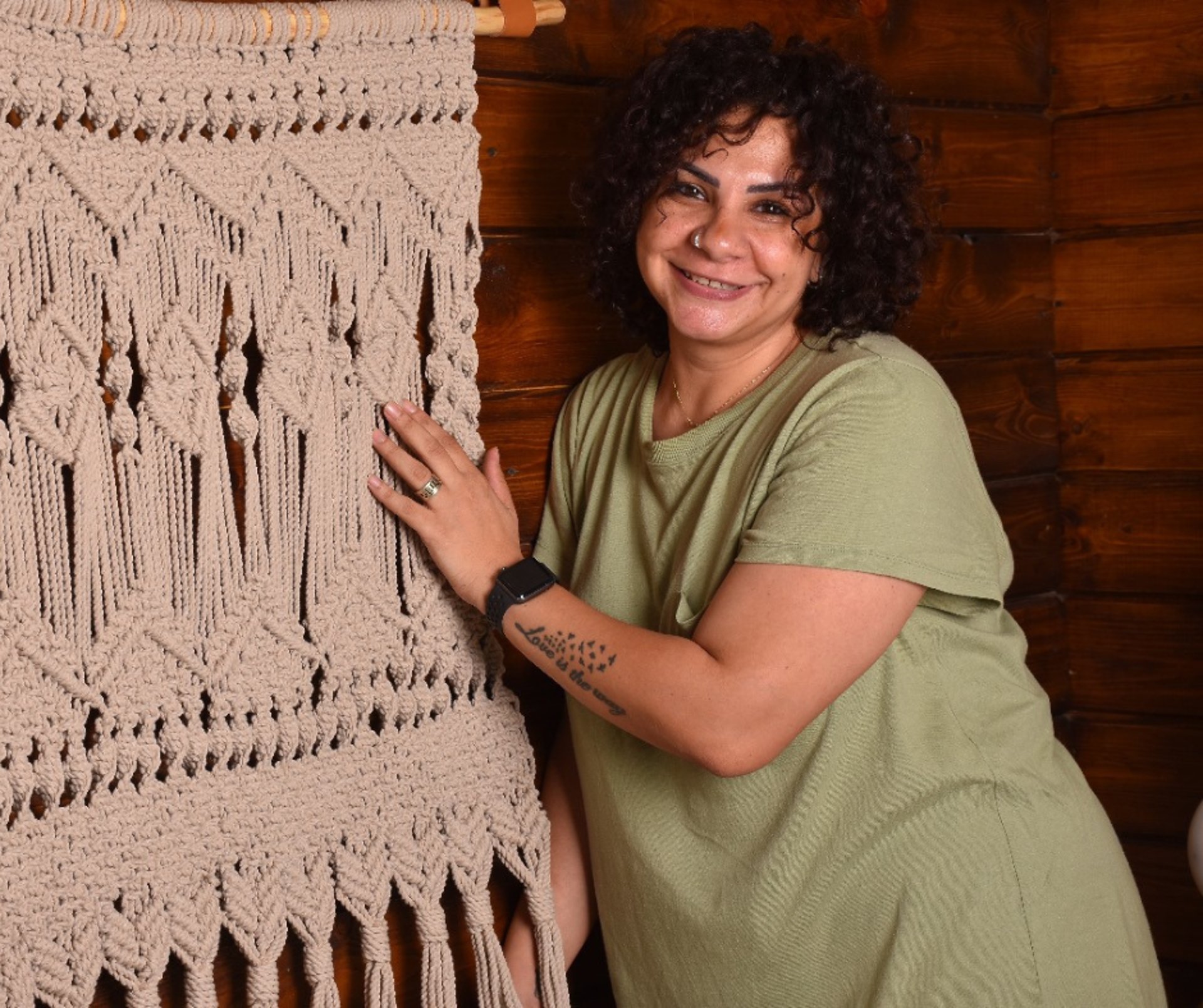 woman holding dried flower