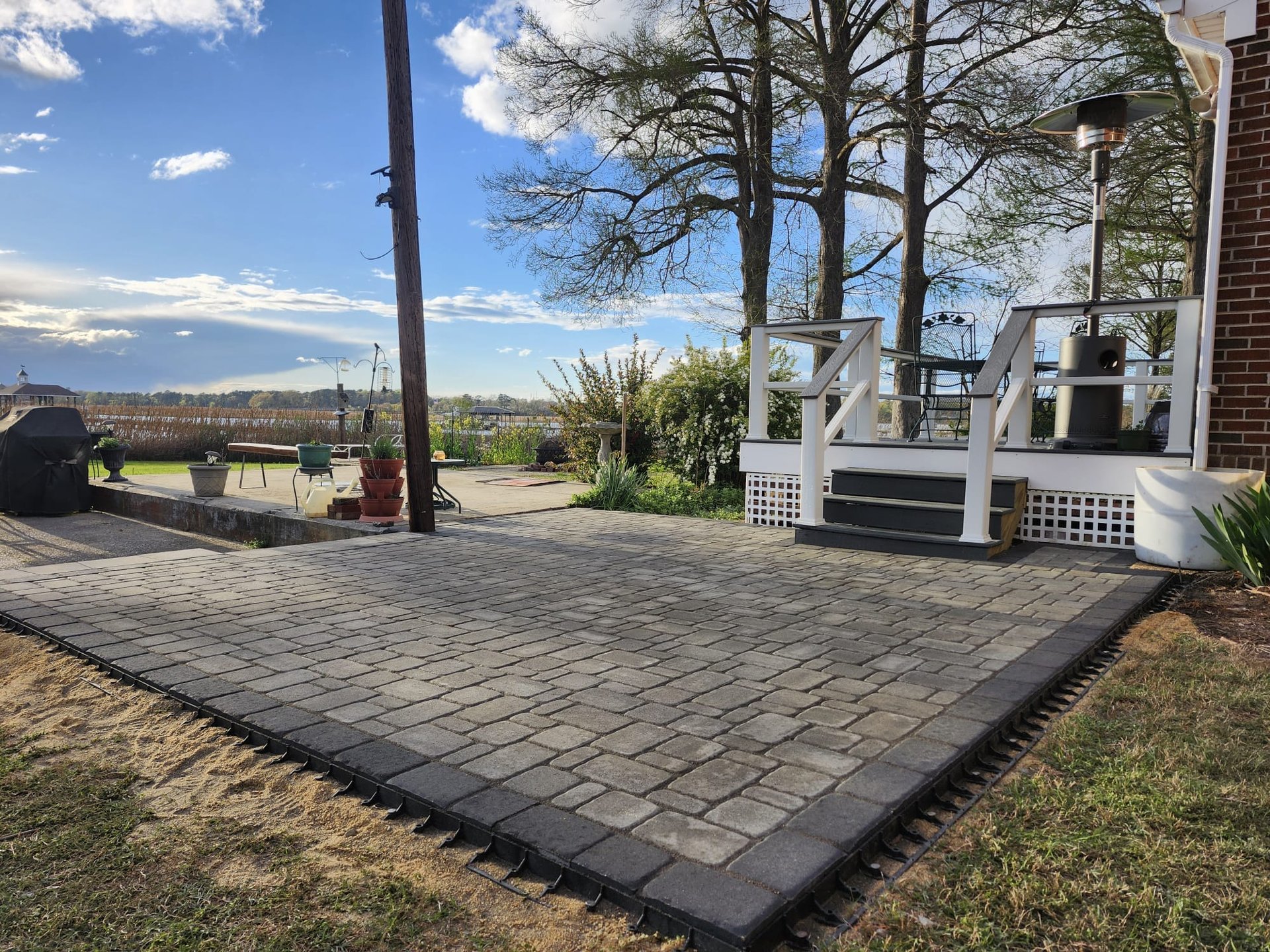 an abstract photo of a curved building with a blue sky in the background