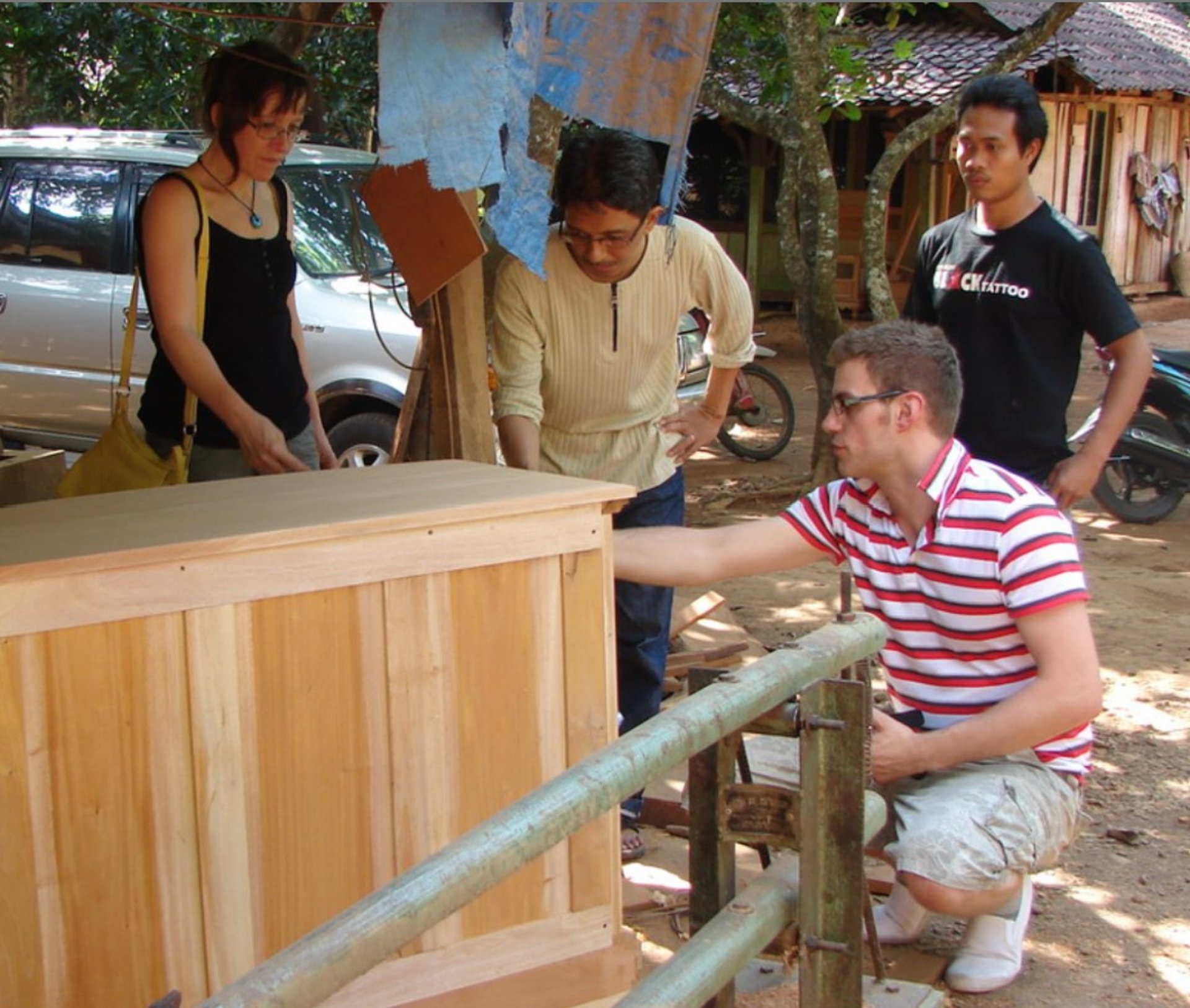 an abstract photo of a curved building with a blue sky in the background