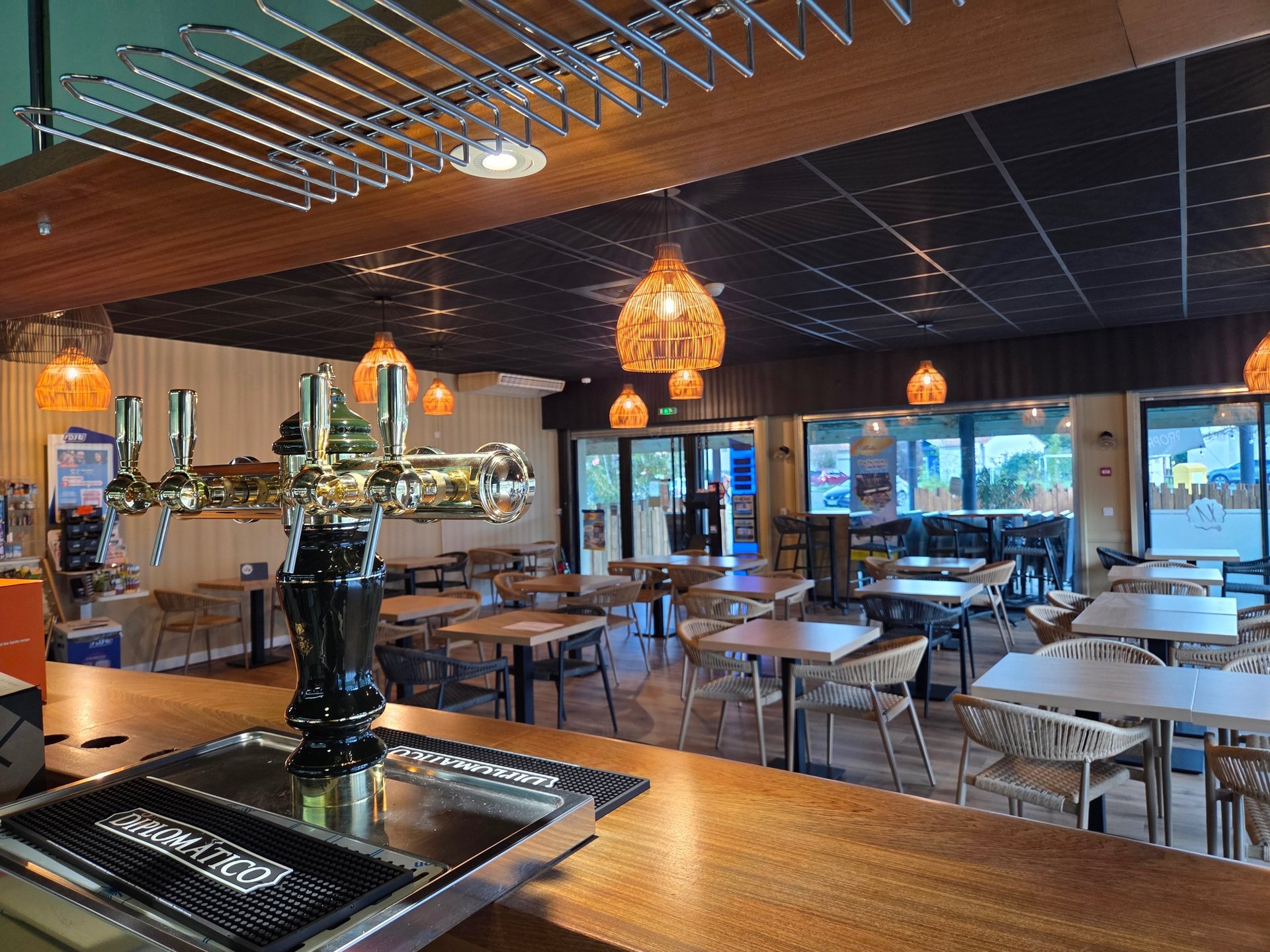 brown wooden tables and chairs inside building