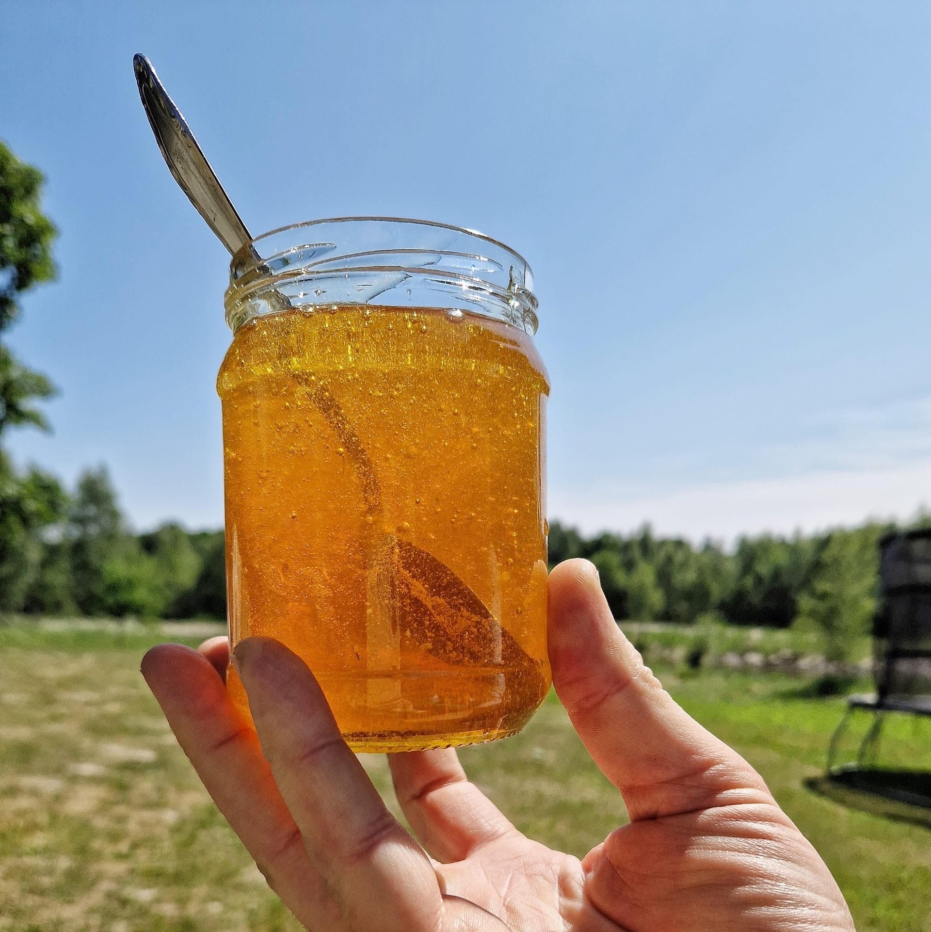 person wearing grey knit sweater