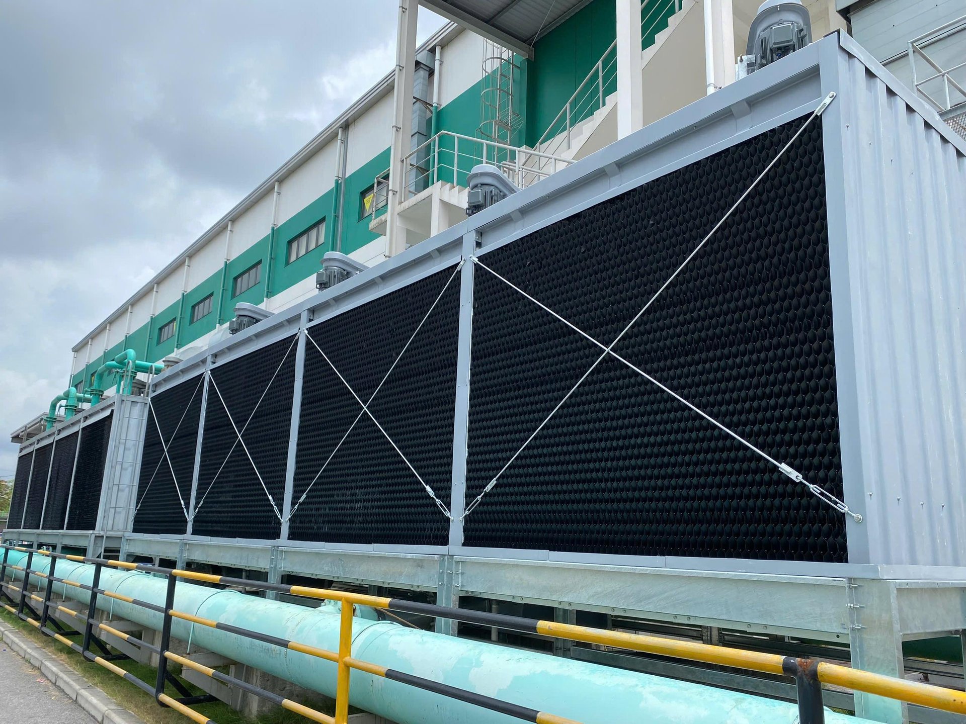 black and brown leather padded tub sofa