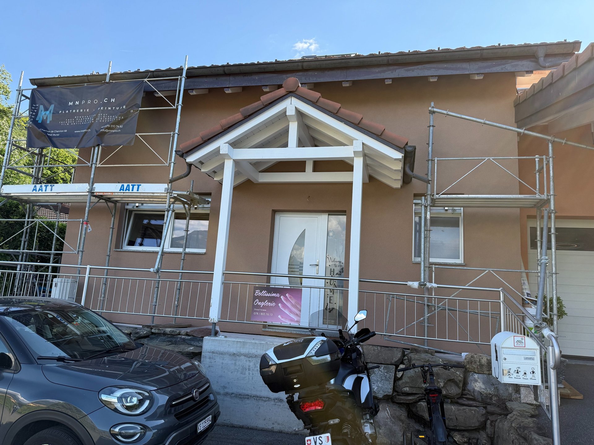 woman wearing yellow long-sleeved dress under white clouds and blue sky during daytime