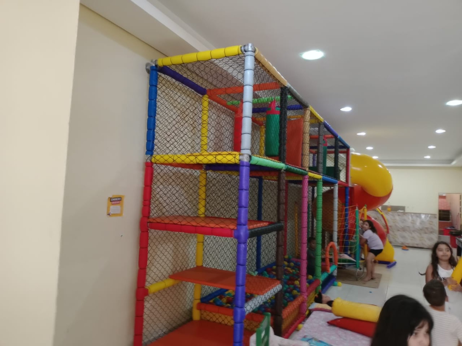 woman wearing yellow long-sleeved dress under white clouds and blue sky during daytime