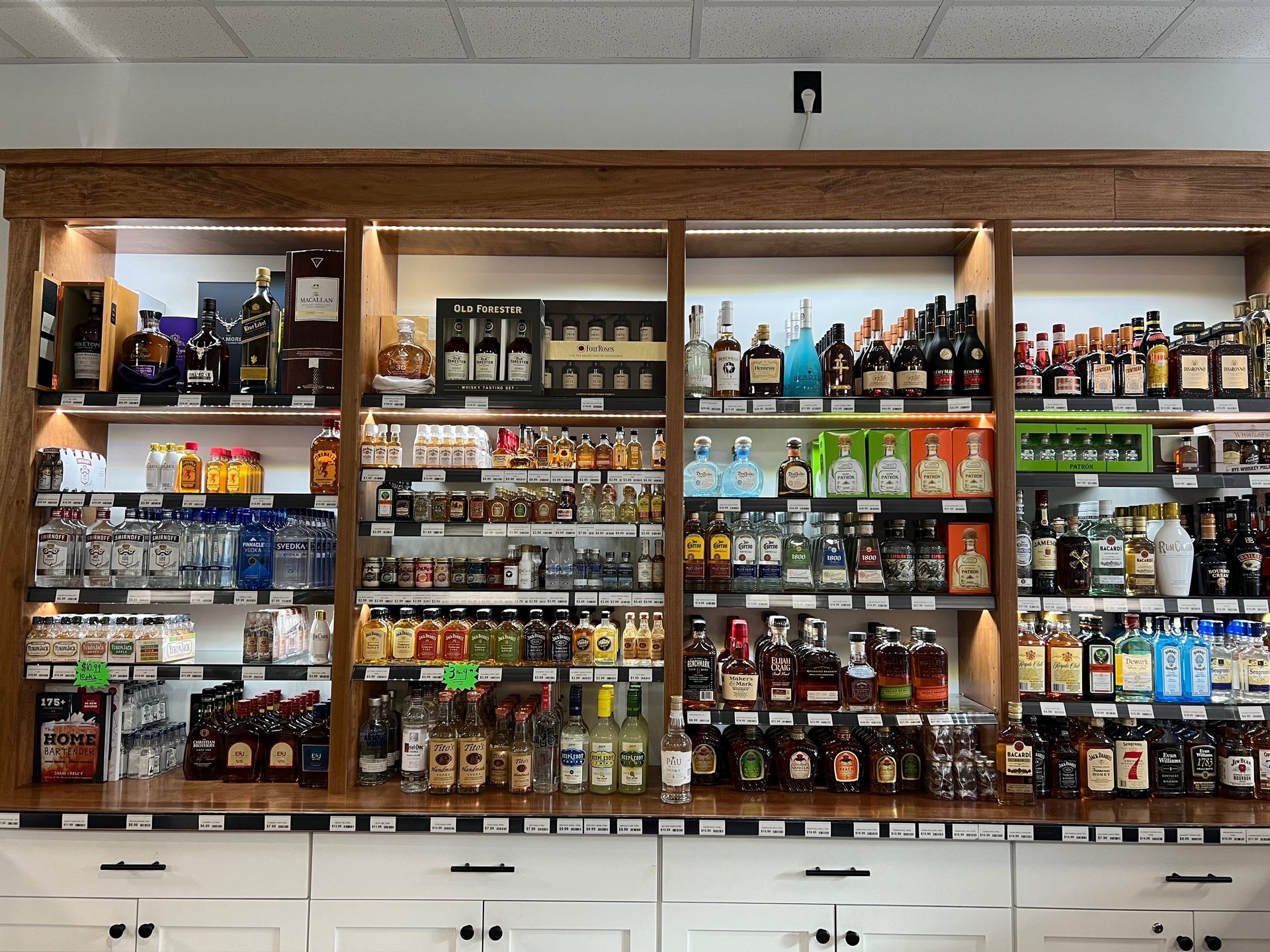 close-up photo of liquor bottles in rack