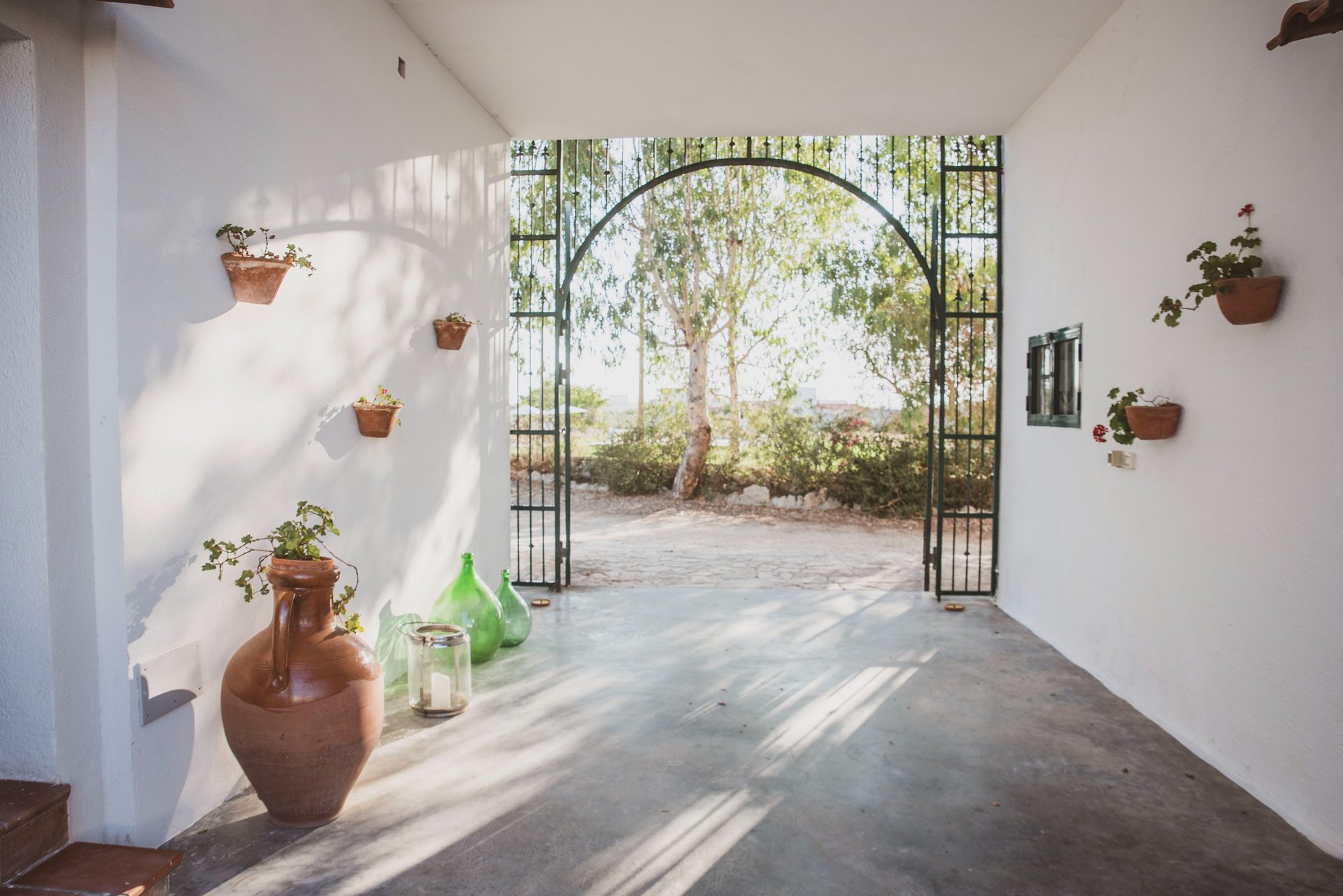 an abstract photo of a curved building with a blue sky in the background