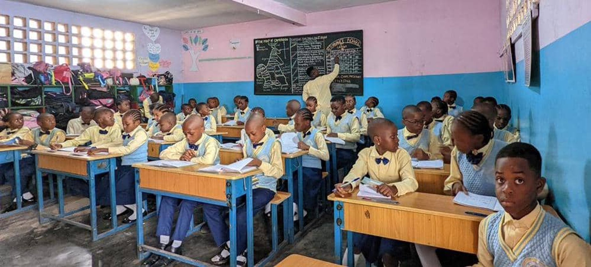 woman wearing yellow long-sleeved dress under white clouds and blue sky during daytime